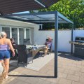 Asiakaskuva Liukukattokuisti 12m² | Liukuva parvekkeen katto | Kanava muovi / alumiini